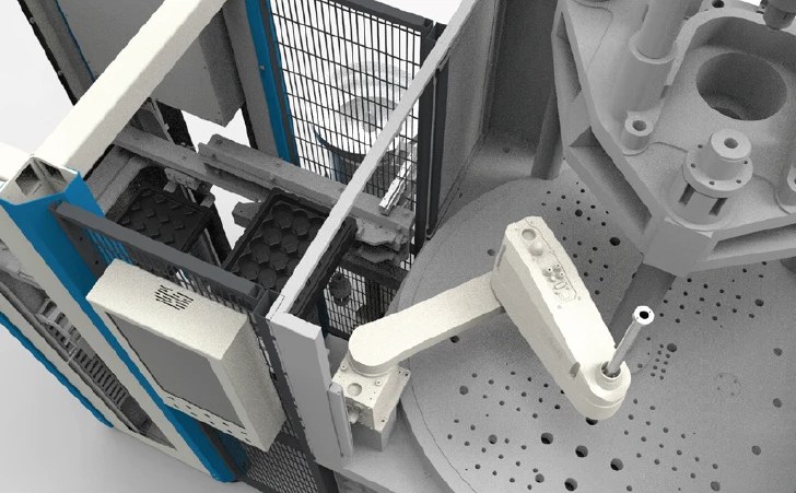 SCARA robot placing inserts on the vertical rotary table next to an insert tray magazine