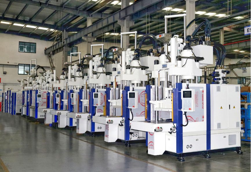 Vertical injection moulding machines on the production floor